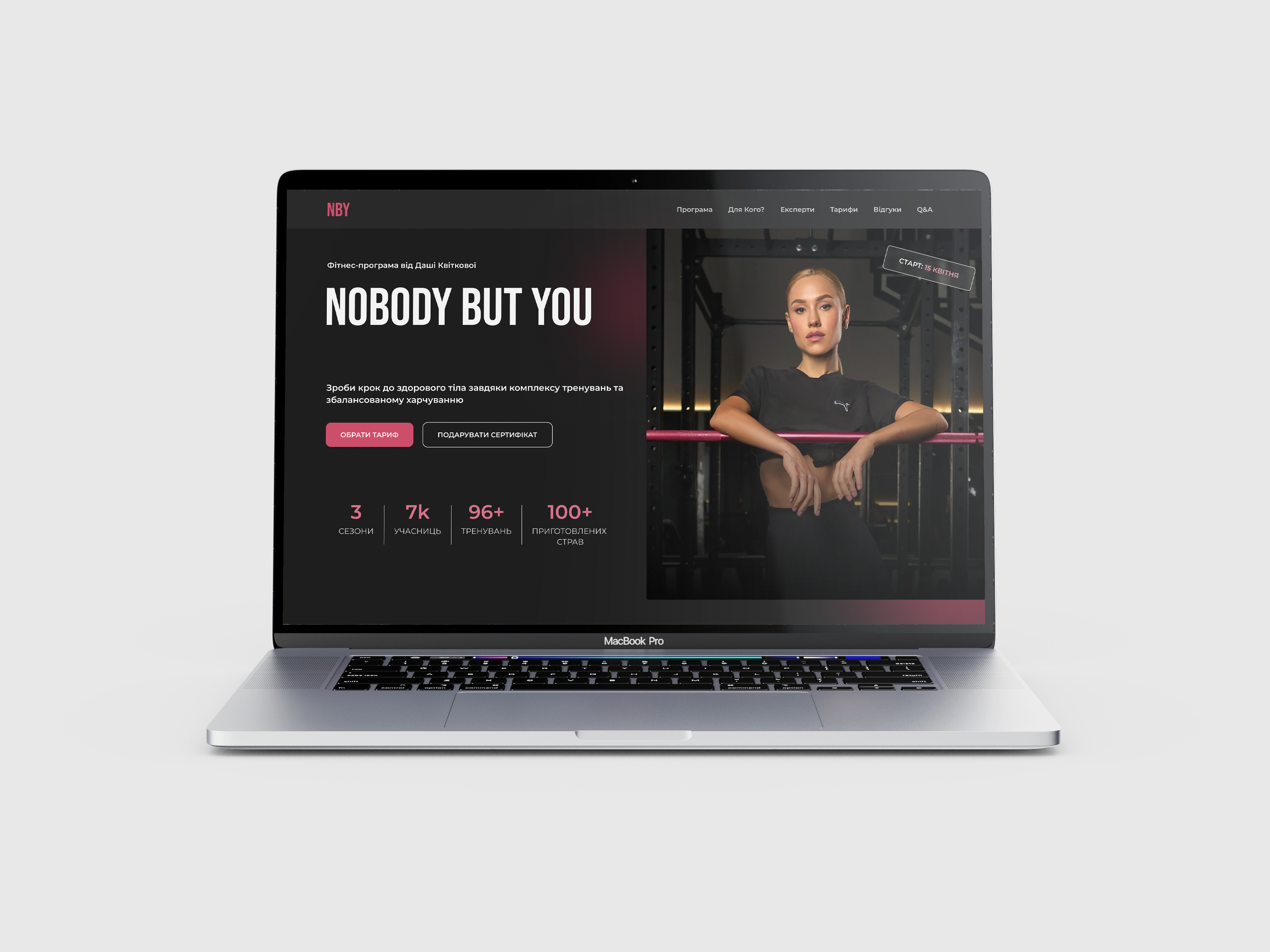 two people sitting on a ledge talking